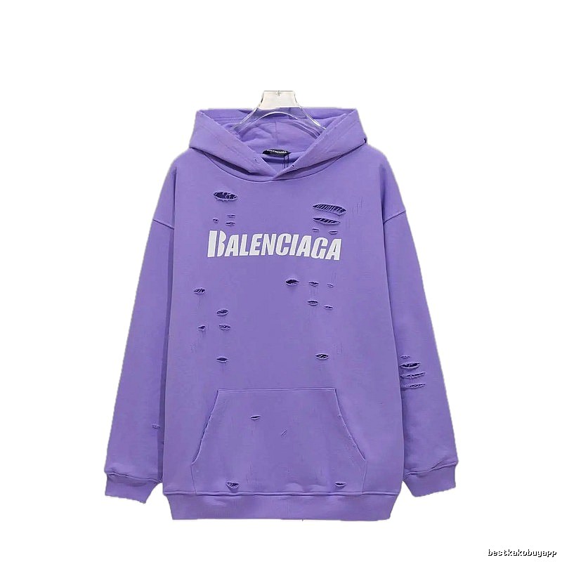 Balenciaga's ripped purple sweatshirt