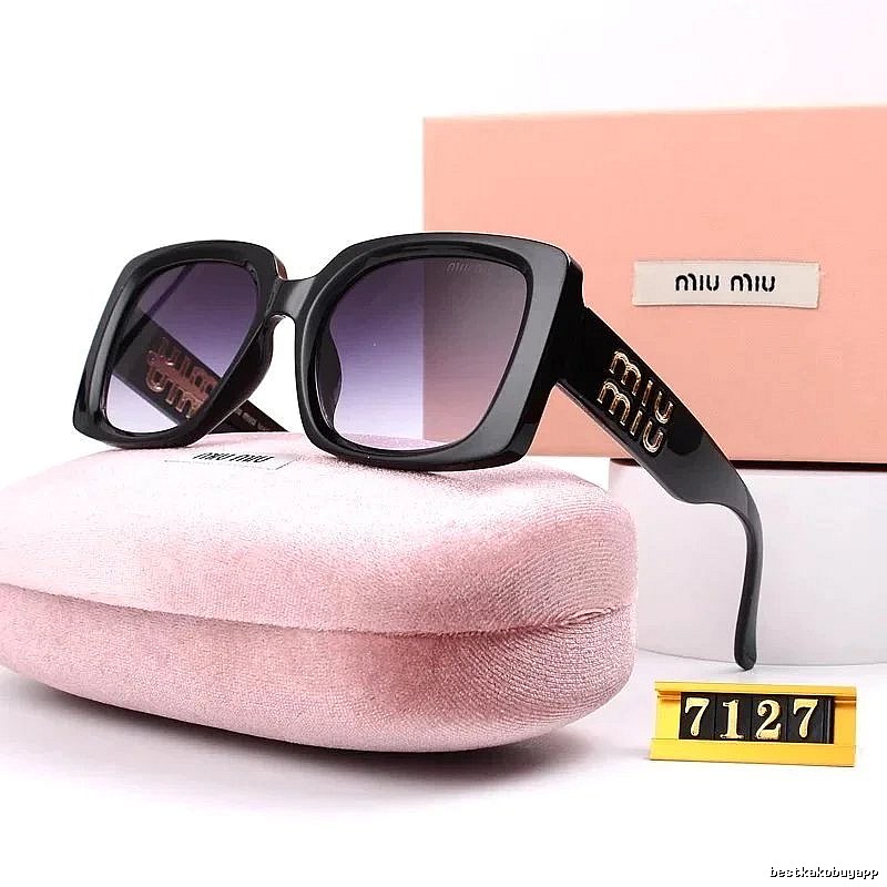Miu Miu Compact Oversized sunglasses Black Oval Sunglasses for Smart Casual Looks