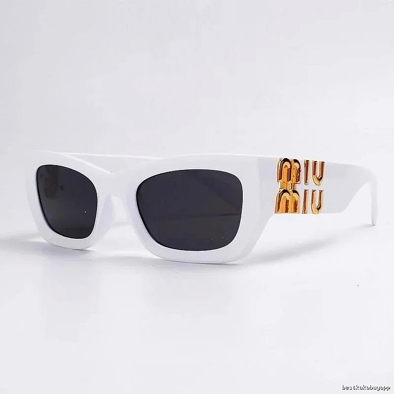 Miu Miu Monogram Oversized sunglasses Black Oval Sunglasses for Layered Styling