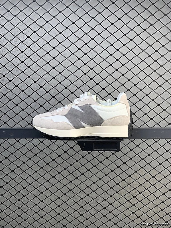 New Balance Gray Retro Runners Highlighting Road Runner Profile