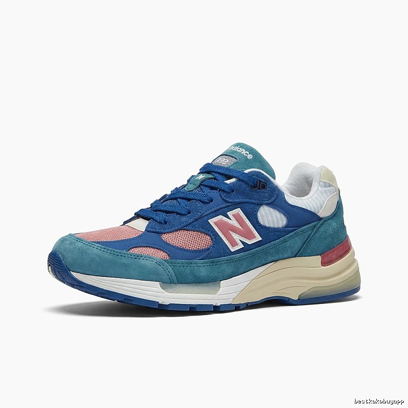 New Balance retro-style blue and pink sports shoes