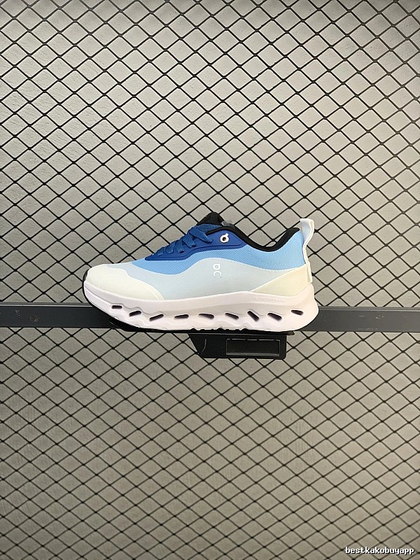 On White and Blue Cloud Runners Highlighting Open Mesh Panels