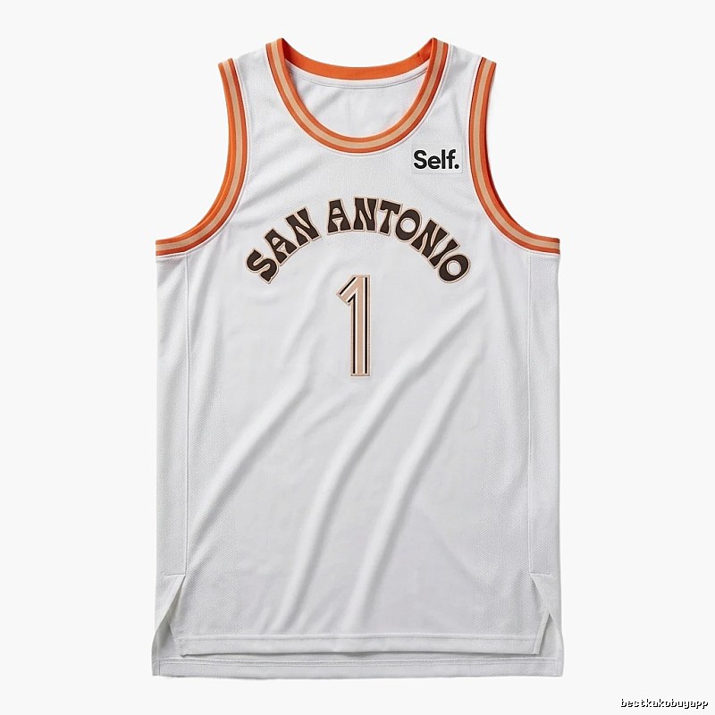 Self. Spurs white and orange basketball jersey